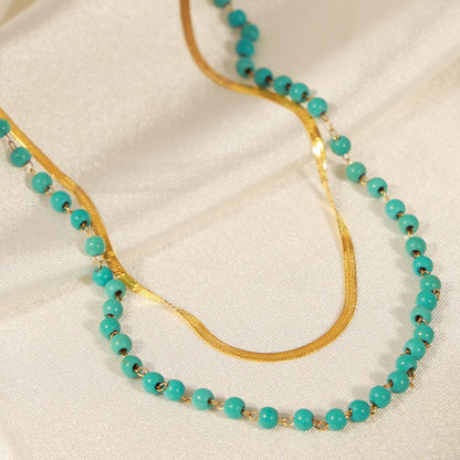 Collier double couche en acier titane turquoise