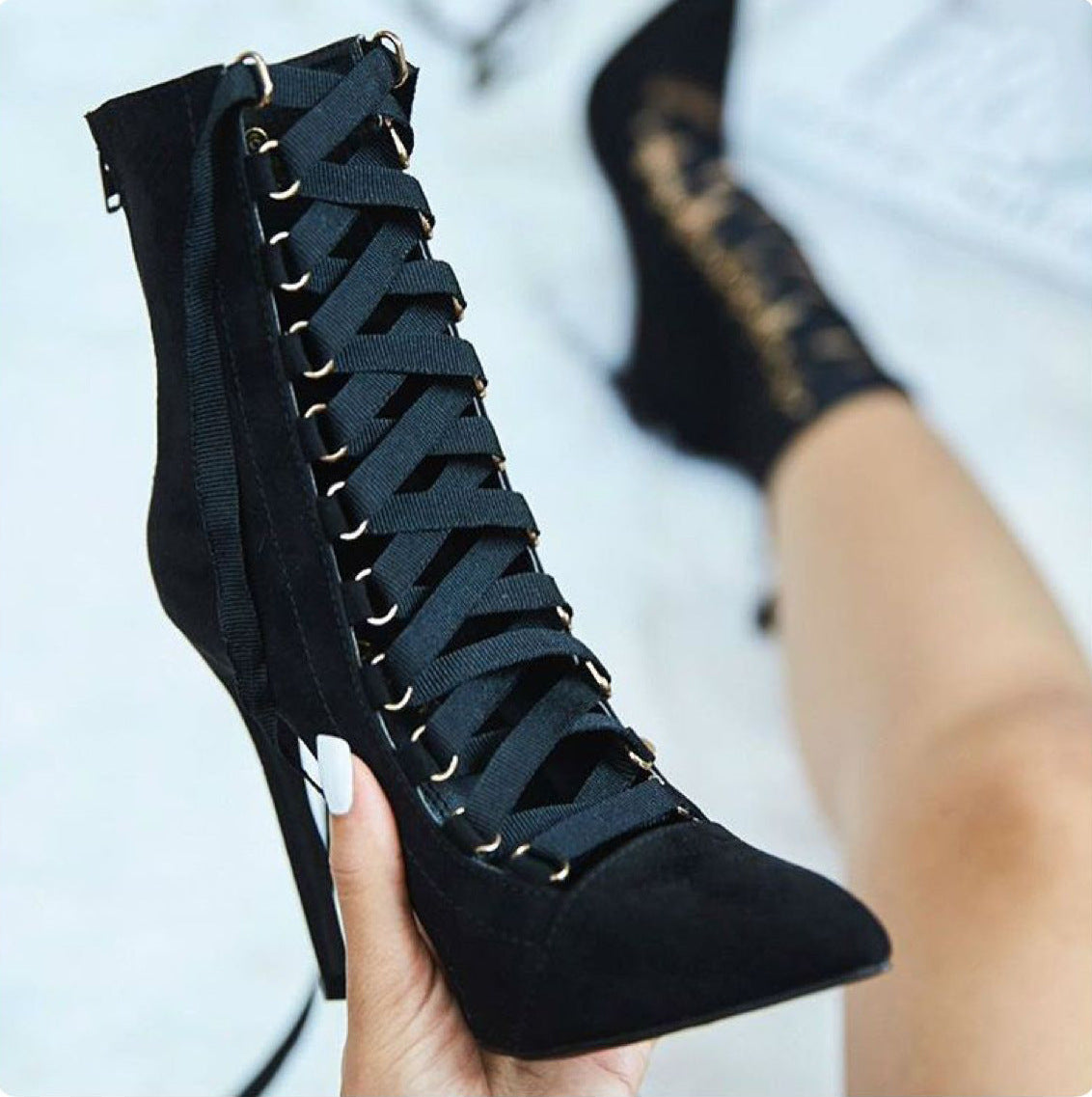 Cross-lacing stiletto boots