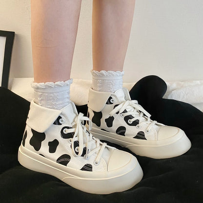 Zapatos de lona de caña alta para niñas con estampado de manchas de vaca