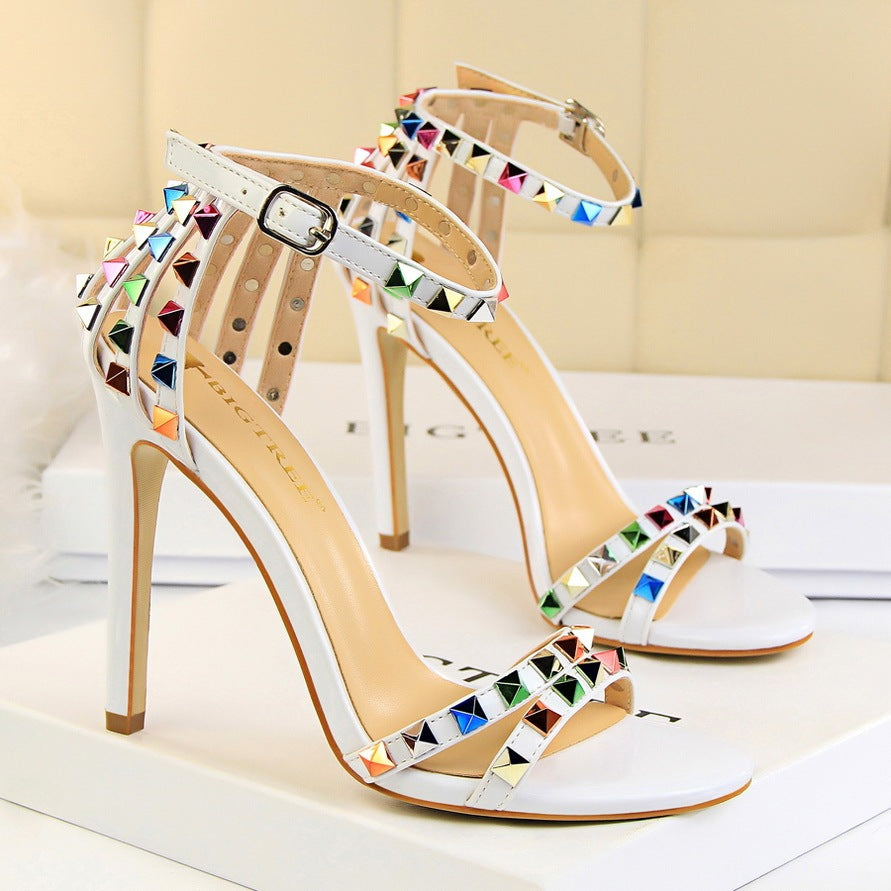 Open-toe sandals with cutout colorful studs