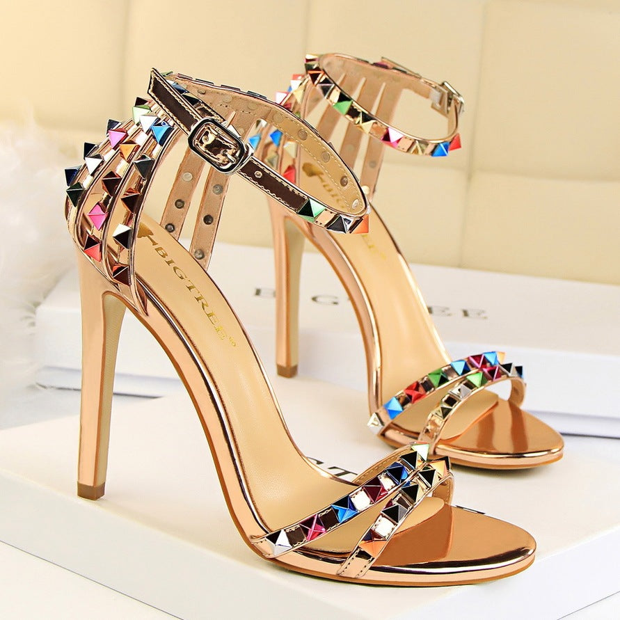 Open-toe sandals with cutout colorful studs