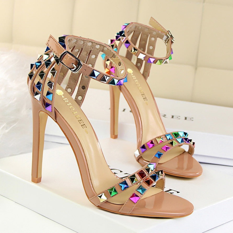 Open-toe sandals with cutout colorful studs