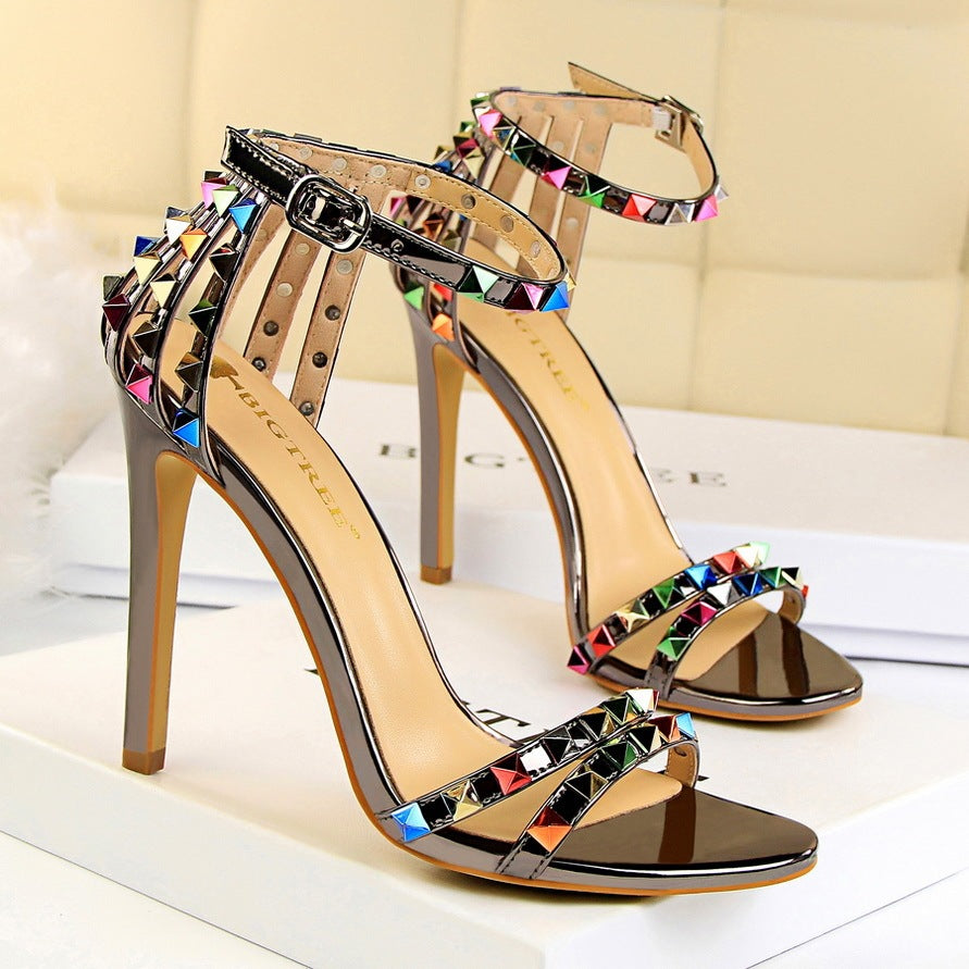 Open-toe sandals with cutout colorful studs