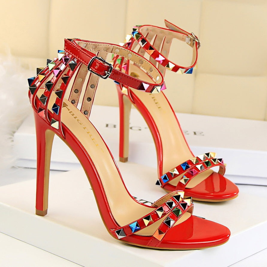 Open-toe sandals with cutout colorful studs