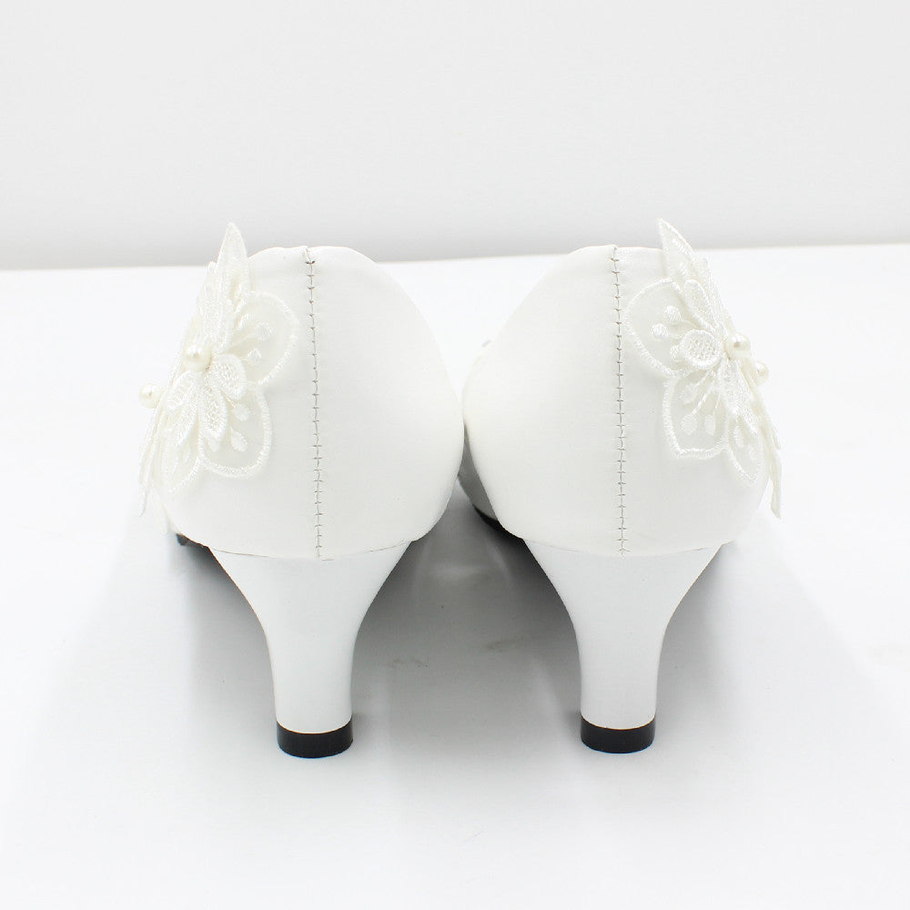 Chaussures de mariage blanches surdimensionnées à talons carrés