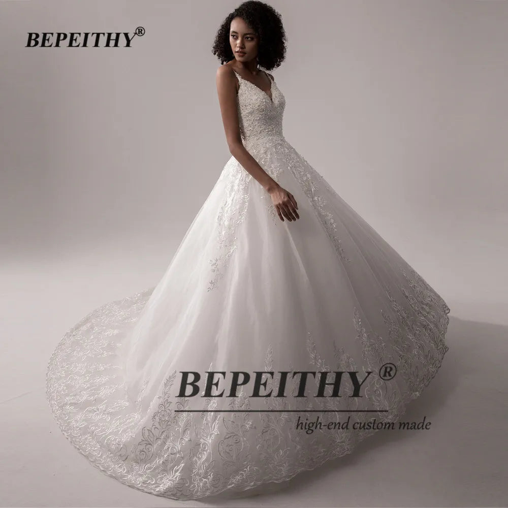 BEPEITHY Vestidos de novia sexys con escote en V y encaje sin espalda para mujer, sin mangas, con abalorios, color blanco marfil, 2023