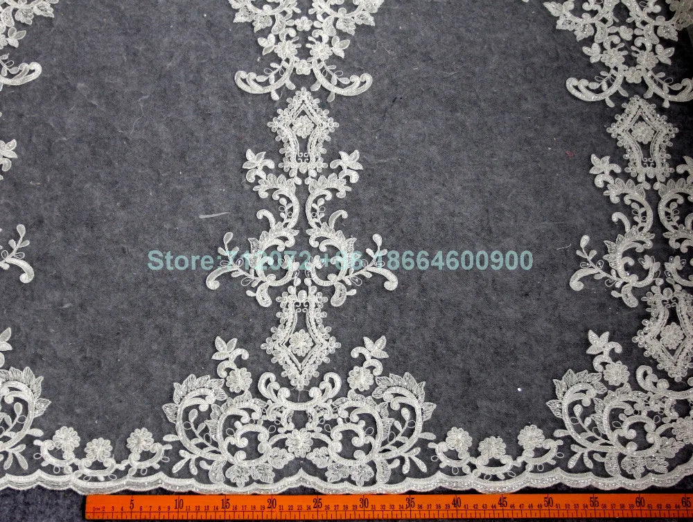 Tissu en dentelle brodée à gros motifs noirs de haute qualité pour robe de mariée/tissu en dentelle pour robe haut de gamme au mètre