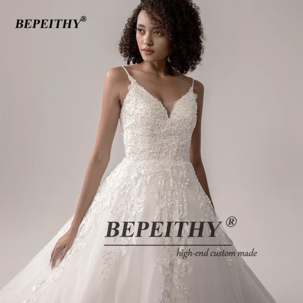 BEPEITHY Sexy Dos Nu Dentelle Corsage Robes De Mariée Pour Femmes Sans Manches Perles Mariée Ivoire Blanc Robe De Mariée 2023 Col En V