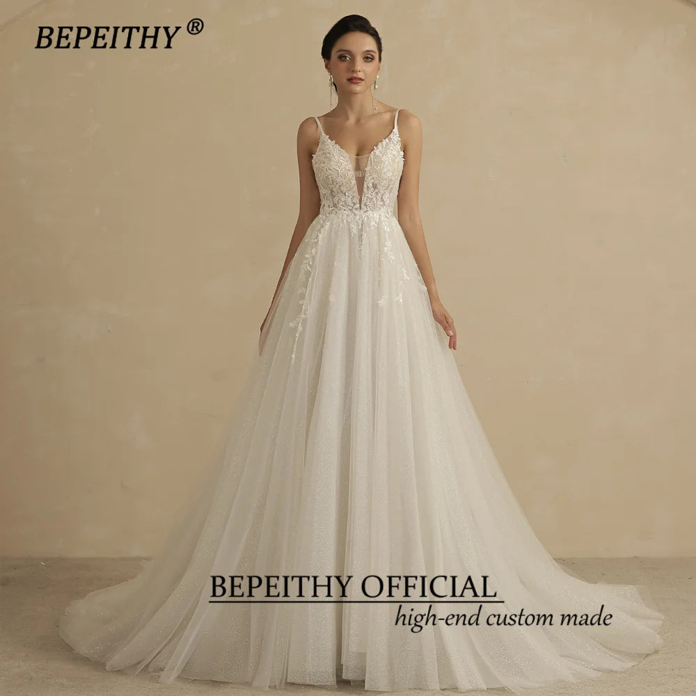 BEPEITHY Vestidos de novia de encaje con escote en V profundo y tirantes finos en forma de A para mujer 2022 Vestido de fiesta nupcial bohemio sin mangas con purpurina