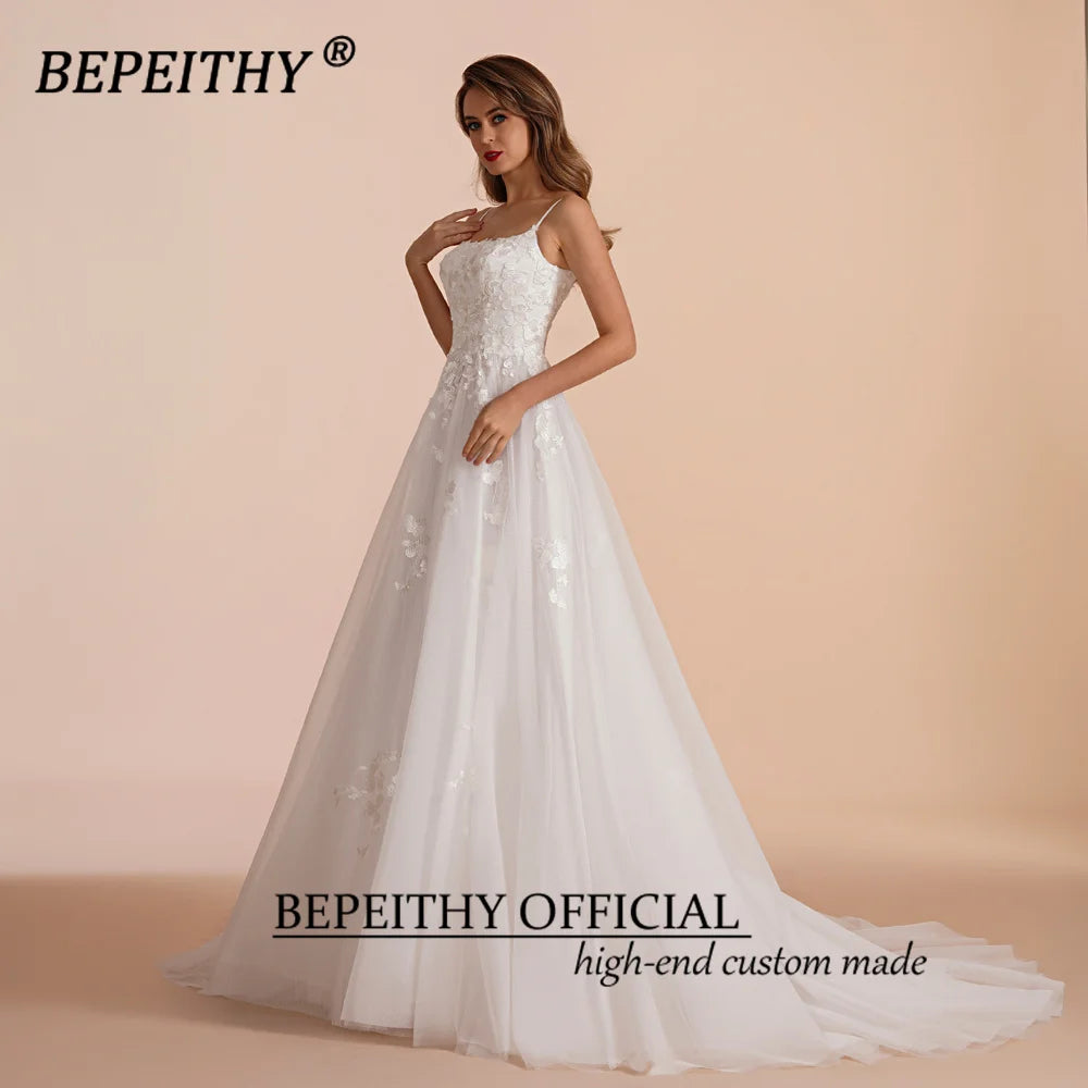 BEPEITHY Vestidos de novia de corte A color marfil 2023 para mujer Vestido de novia sin mangas con cola larga Boho Robe De Mariée Vestido de novia blanco