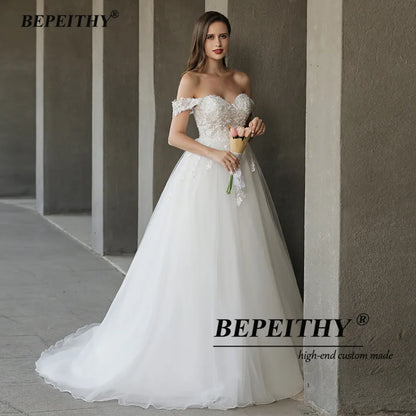 BEPEITHY Robes de mariée en cœur pour femmes mariée Boho A Line grande taille hors de l'épaule dentelle robe de mariée de plage sans manches