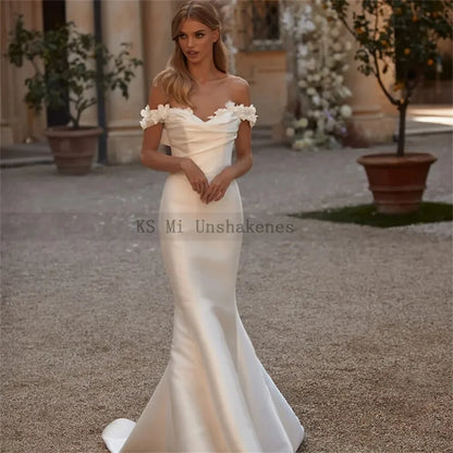 Robe de mariée sirène ivoire à traîne amovible et épaules dénudées avec fleurs 3D Robe de mariée en satin avec jupe en satin Robe de mariée grande taille