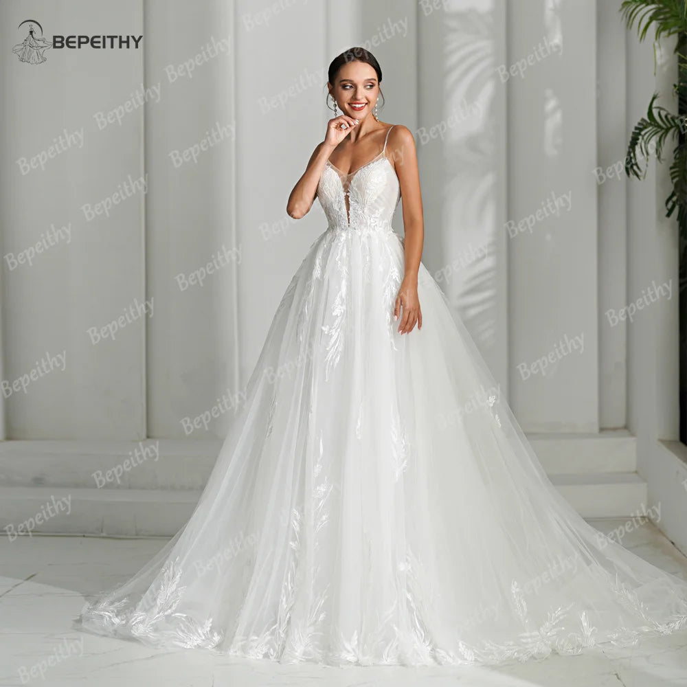 BEPEITHY Vestidos de novia bohemios con tirantes finos y corte en A para mujer, sin mangas, color marfil, escote en V, vestido de novia blanco 2024