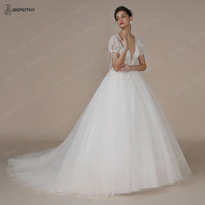 BEPEITHY Short Sleeves A Line Ivory Wedding Dresses For Women Sexy V Neck Open Back Boho Pearls Bride Glitter Bridal Gown 2023