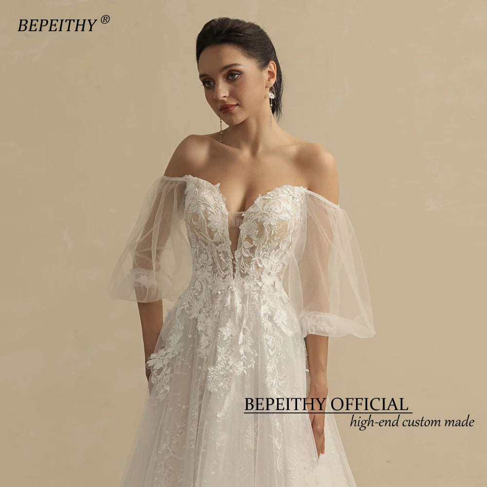 BEPEITHY Shinny Glittle A Line Skirt Ivory Robes de mariée pour femmes avec manches bouffantes Robe de mariée sexy en dentelle chérie 2022