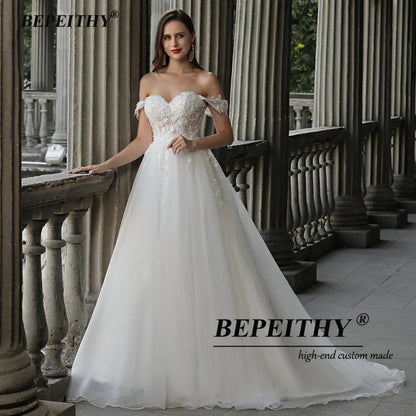 BEPEITHY Robes de mariée en cœur pour femmes mariée Boho A Line grande taille hors de l'épaule dentelle robe de mariée de plage sans manches