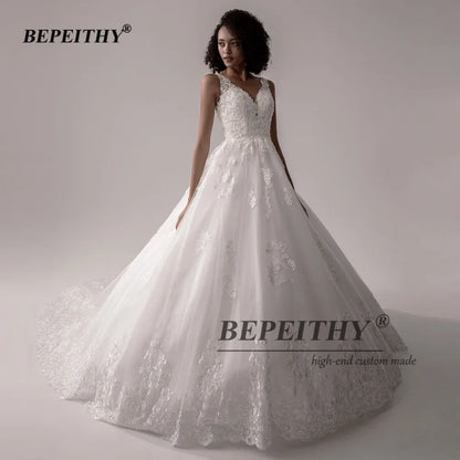 BEPEITHY Robes de mariée modernes élégantes pour femmes, col en V, sans manches, robe de mariée princesse sur mesure haut de gamme