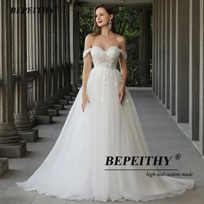 BEPEITHY Robes de mariée en cœur pour femmes mariée Boho A Line grande taille hors de l'épaule dentelle robe de mariée de plage sans manches