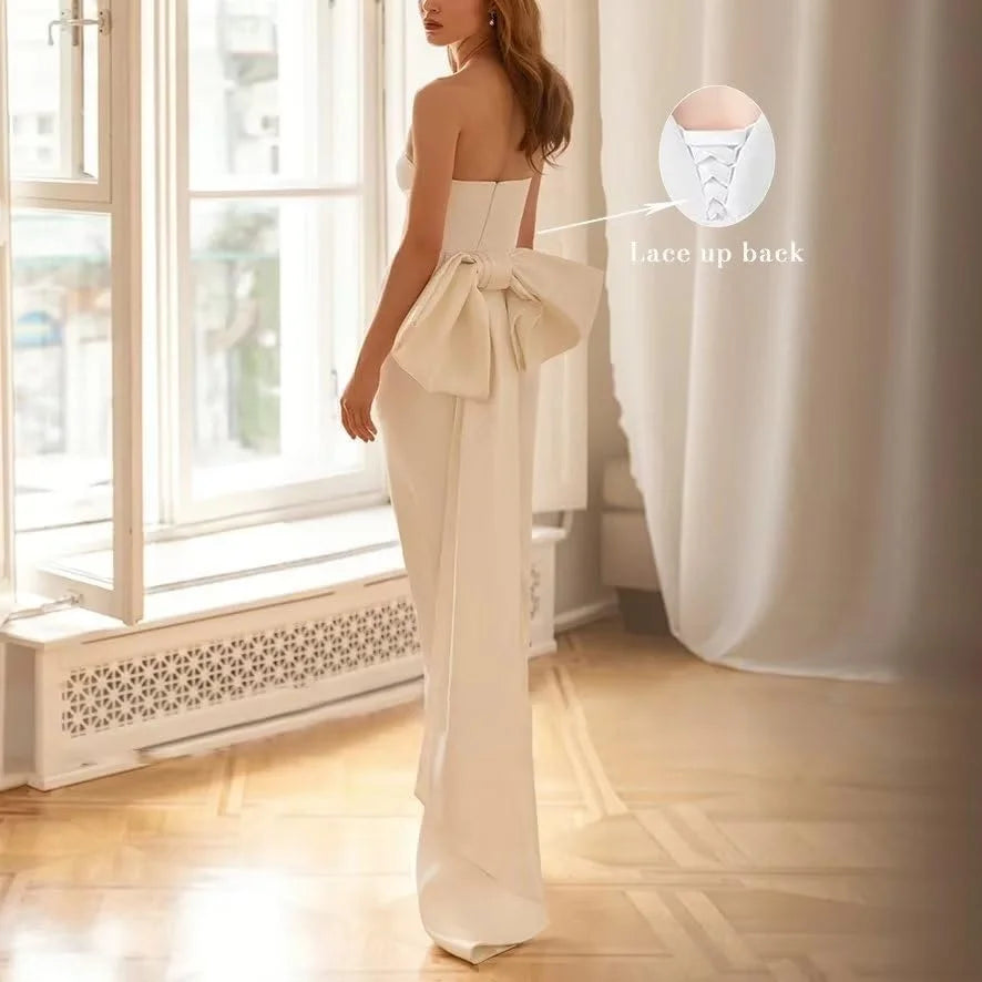 Robe de mariée blanche simple et sexy sirène dos nu avec nœud plissé en satin robe de mariée sans bretelles sans manches mi-mollet train tribunal 2024