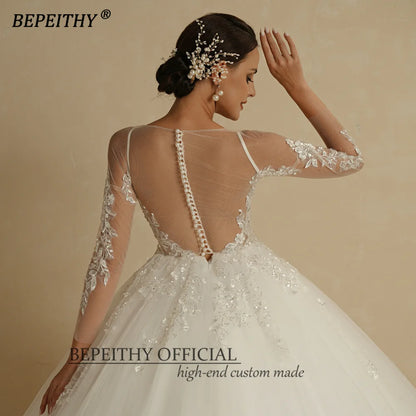 BEPEITHY Robe de mariée sexy à col rond et haut transparent en ivoire à fleurs 2022 pour femmes, manches longues, traîne, bouton au dos, robe de bal de mariée