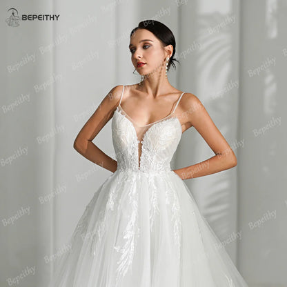 BEPEITHY Vestidos de novia bohemios con tirantes finos y corte en A para mujer, sin mangas, color marfil, escote en V, vestido de novia blanco 2024