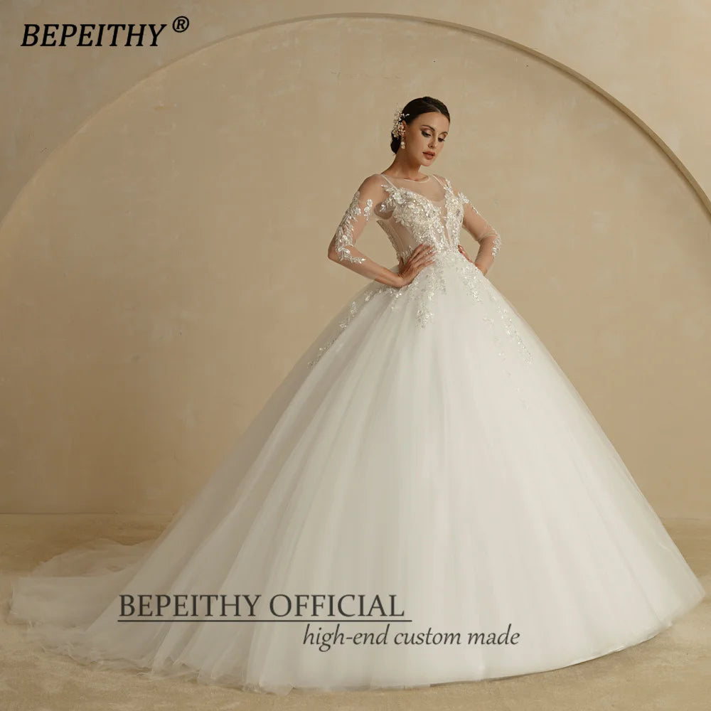 BEPEITHY Robe de mariée sexy à col rond et haut transparent en ivoire à fleurs 2022 pour femmes, manches longues, traîne, bouton au dos, robe de bal de mariée