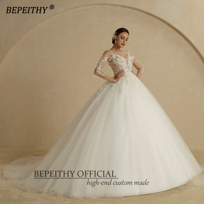 BEPEITHY Robe de mariée sexy à col rond et haut transparent en ivoire à fleurs 2022 pour femmes, manches longues, traîne, bouton au dos, robe de bal de mariée