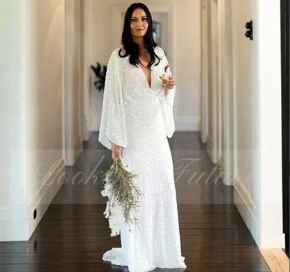 Vestido de novia de lujo con mangas largas transparentes y brillantes, espalda descubierta profunda con lentejuelas y abalorios, vestido de novia moderno 2024