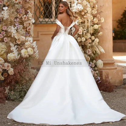 Robe de mariée sirène ivoire à traîne amovible et épaules dénudées avec fleurs 3D Robe de mariée en satin avec jupe en satin Robe de mariée grande taille