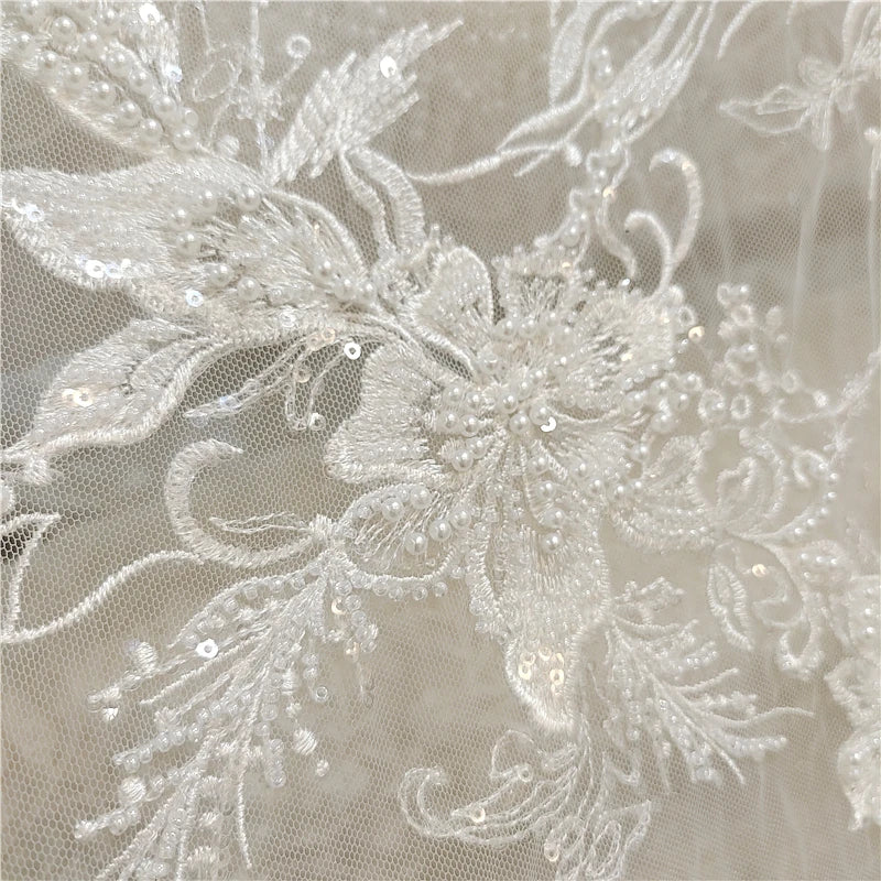 Tissu de dentelle brodé de luxe à paillettes et perles au mètre, matériel de couture brodé de fleurs pour robe de mariée, voile, costume