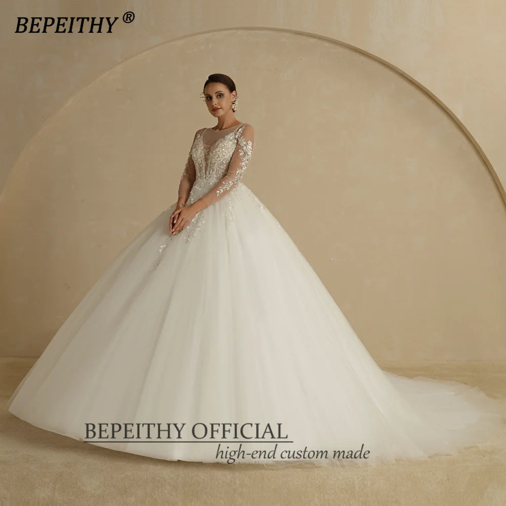 BEPEITHY Robe de mariée sexy à col rond et haut transparent en ivoire à fleurs 2022 pour femmes, manches longues, traîne, bouton au dos, robe de bal de mariée