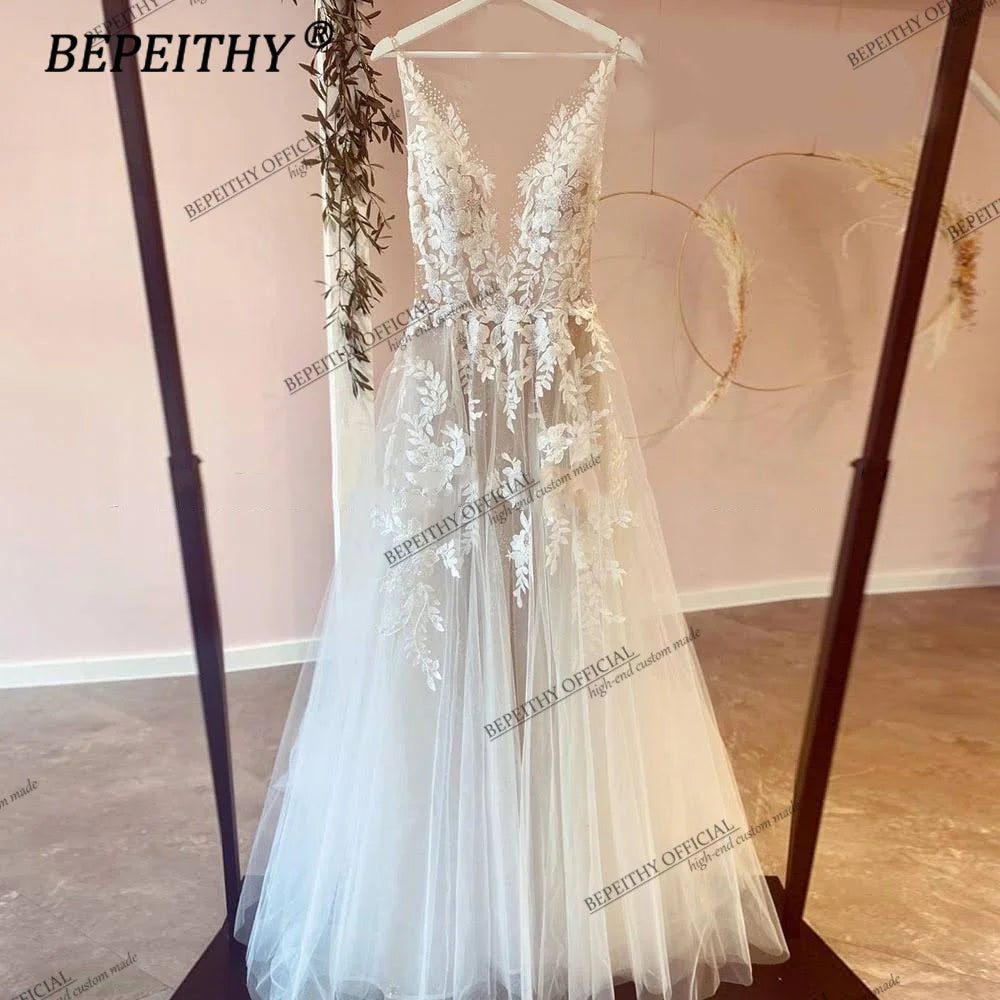 BEPEITHY Vestidos de fiesta de boda románticos de encaje con escote redondo para novia sin mangas en forma de A hasta el suelo sin espalda para mujer Vestido de novia blanco bohemio