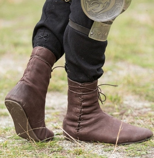 Botas de mujer de suela plana con tiras cruzadas