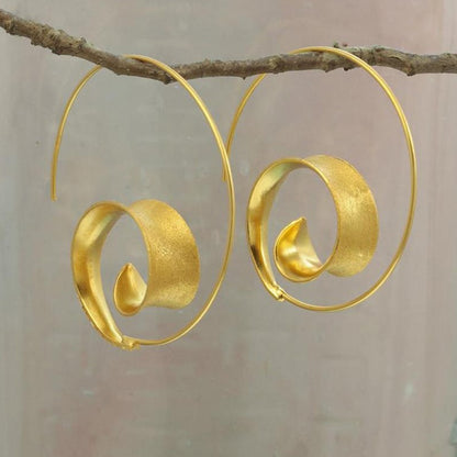 Boucles d'oreilles créoles en forme de spirale