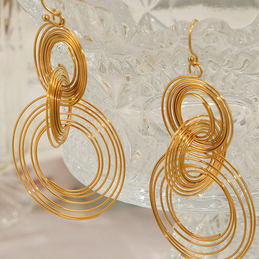 Boucles d'oreilles rondes multicouches en acier titane